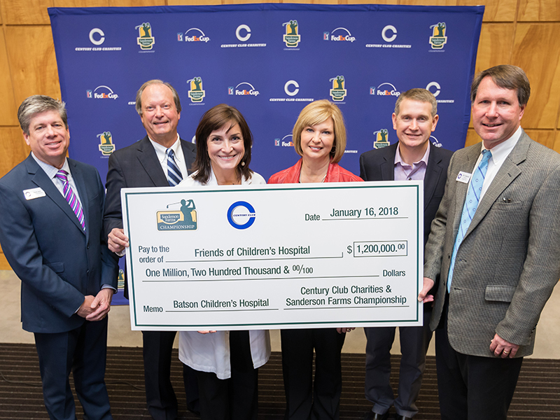 Showing off the $1.2 million donation from Century Club Charities to Friends of Children’s Hospital are, from left, Steve Jent, Sanderson Farms Championship executive director, Sidney Allen, Friends board chairman, Dr. Mary Taylor, pediatrics chair, Dr. LouAnn Woodward, vice chancellor for health affairs, Guy Giesecke, Children’s of Mississippi CEO, and Jeff Hubbard, Century Club Charities president.